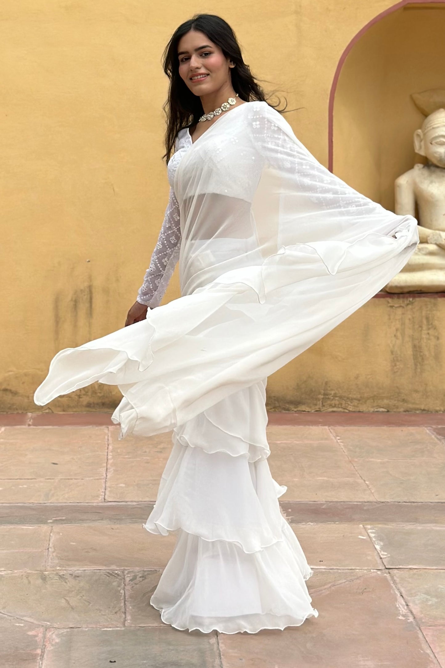 Off White Georgette Ruffle Saree With Embroidered Blouse