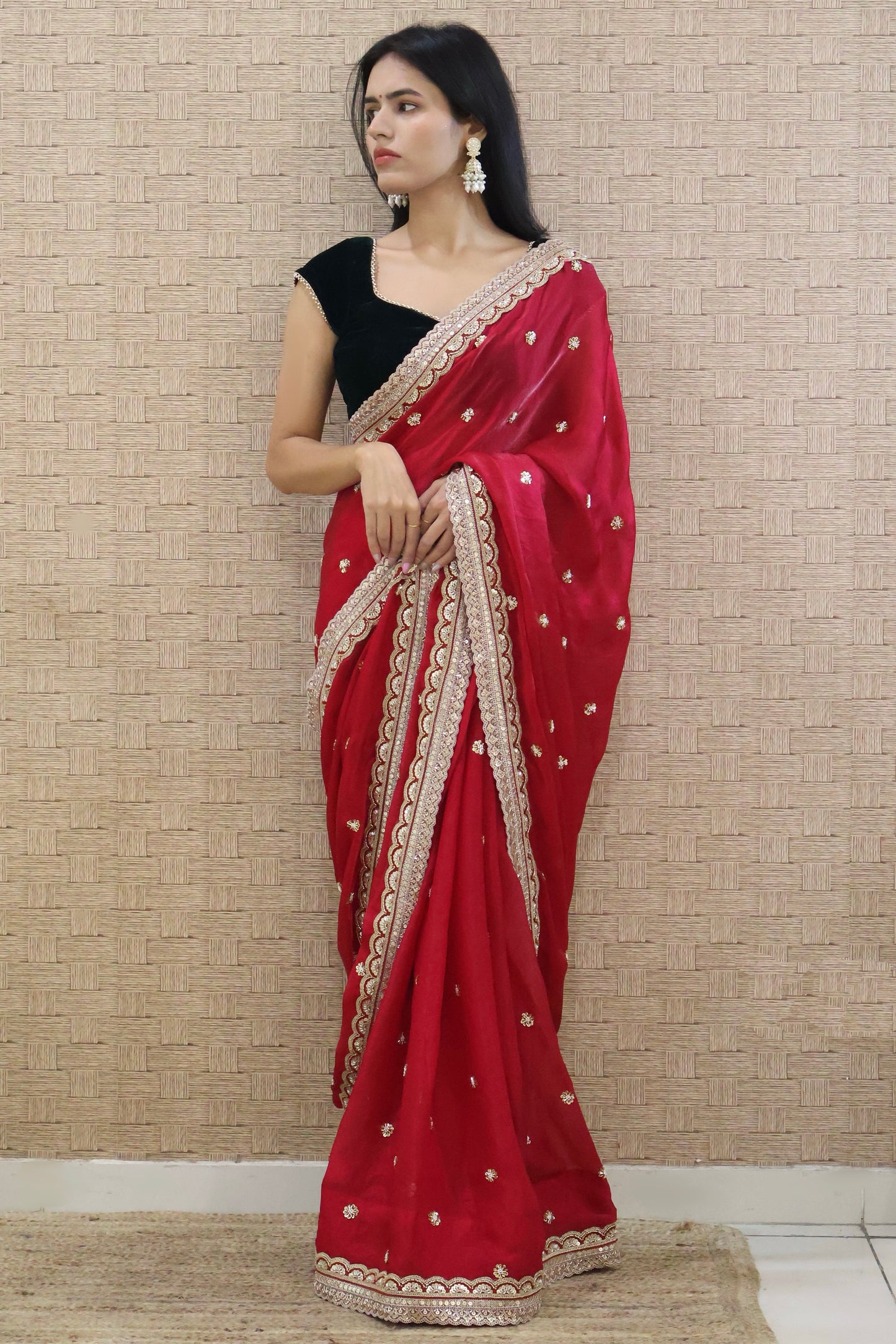 Cherry red embroidered saree with Bottle Green Velvet Blouse