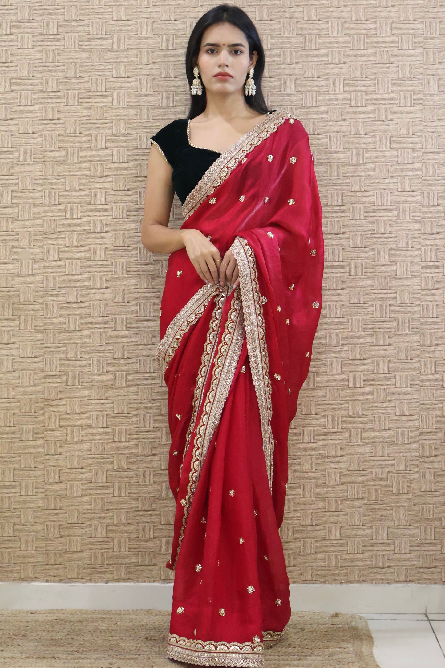 Cherry red embroidered saree with Bottle Green Velvet Blouse