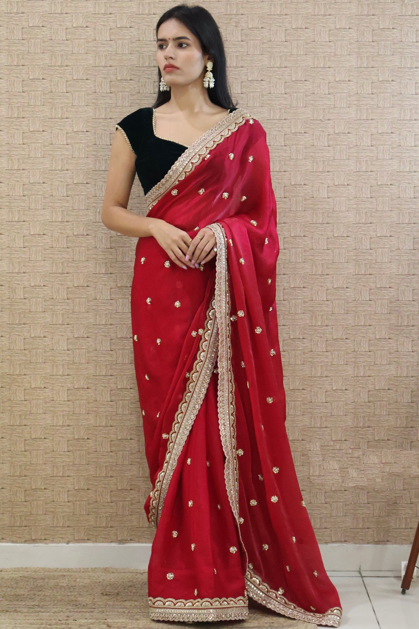 Cherry red embroidered saree with Bottle Green Velvet Blouse
